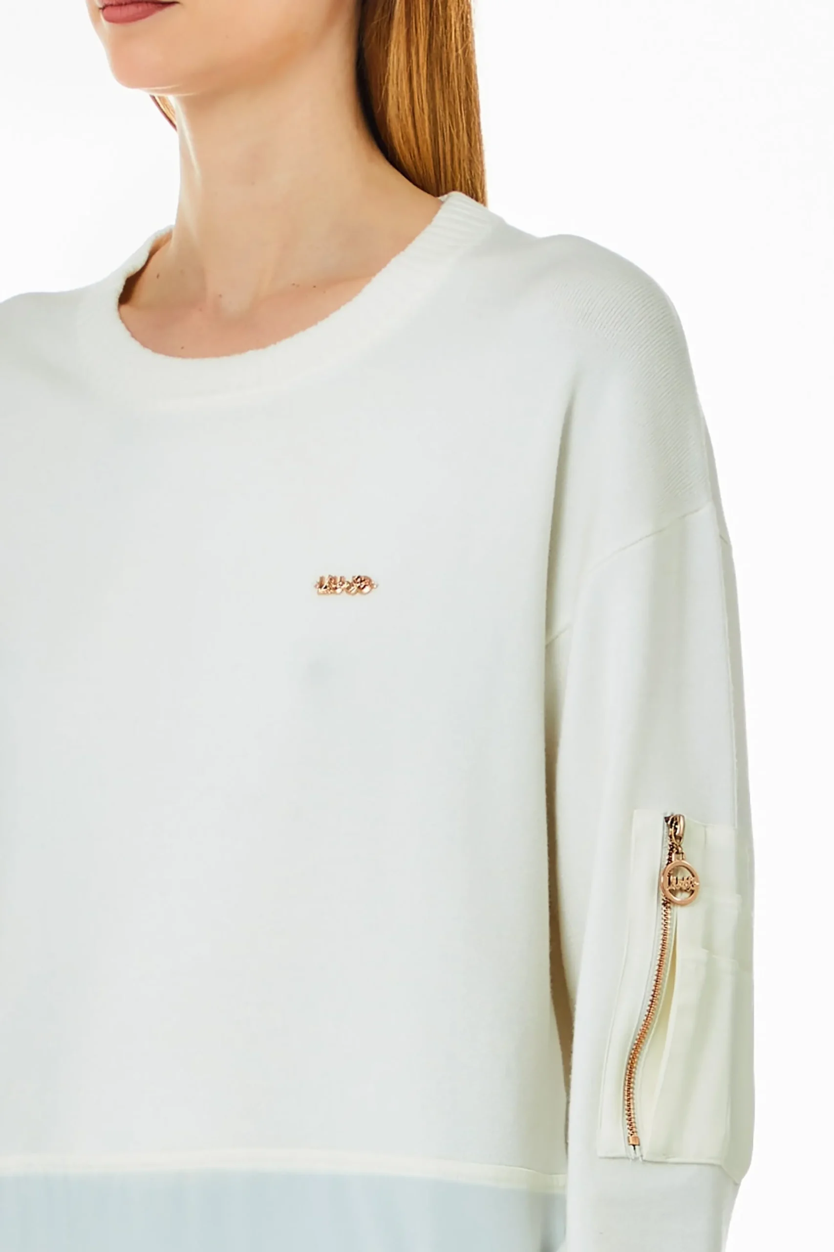 maglia_girocollo_con_dett_1.webp Fashion Maglia girocollo con dettagli a contrasto e tasca con zip di Donna Felpe